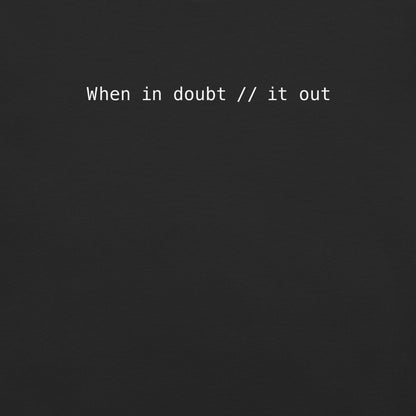 When In Doubt Comment It Out Unisex T-Shirt in Black